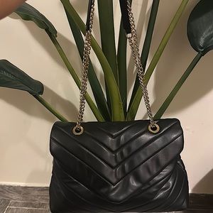 Black quilted purse.